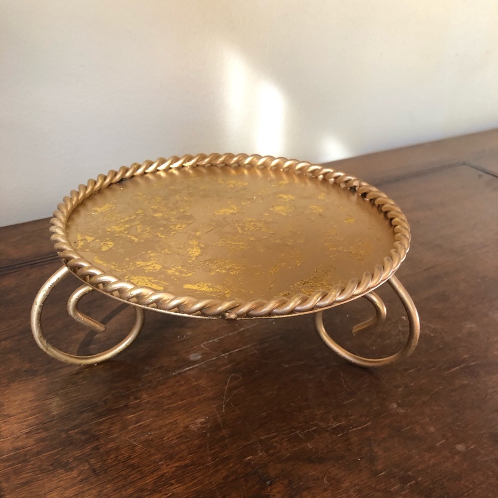 Gold Metallic candle holder.